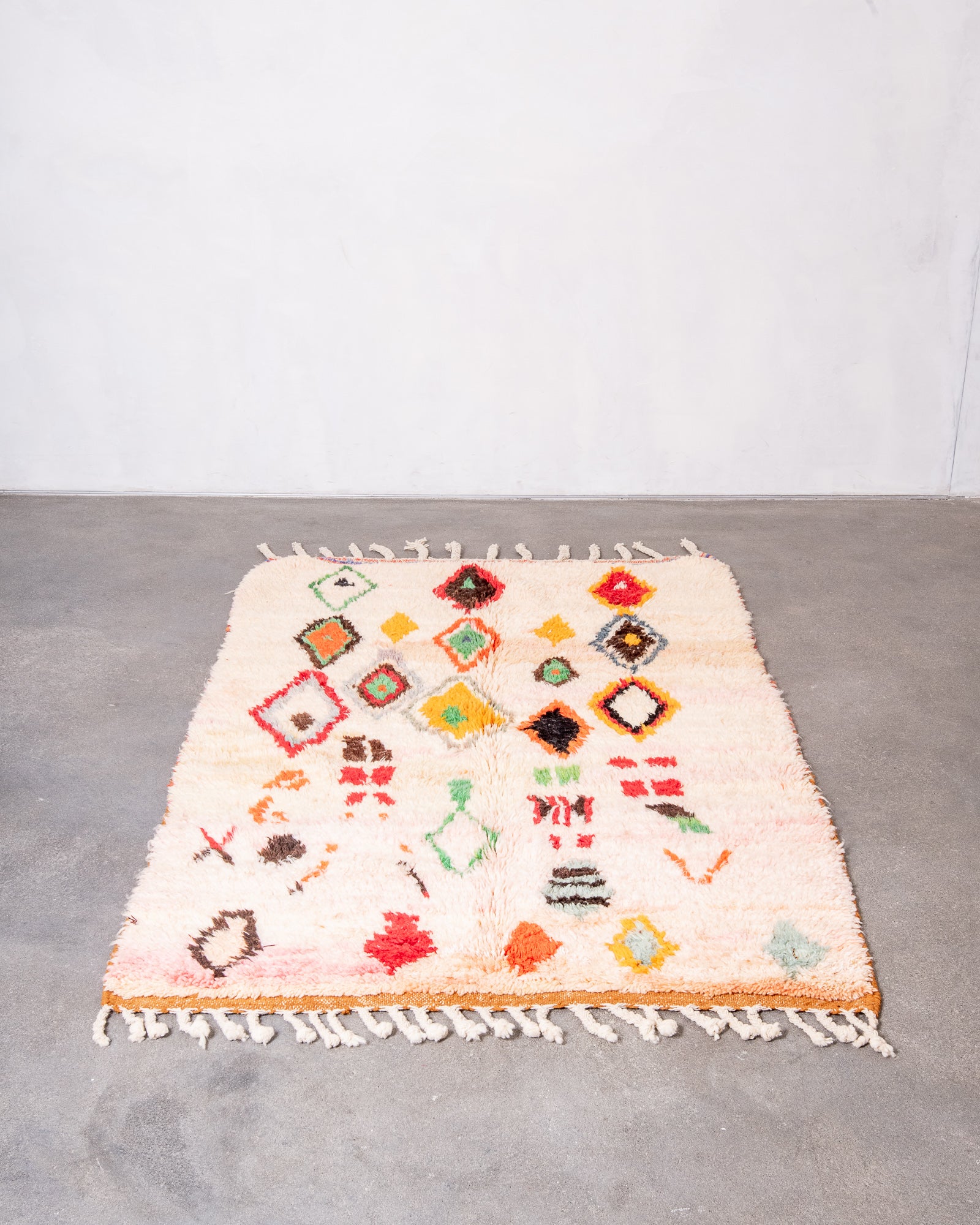 Modern, designer, handcrafted Berber rug from Morocco. Vintage carpet with beautiful colours and patterns and fluffy wool texture.
